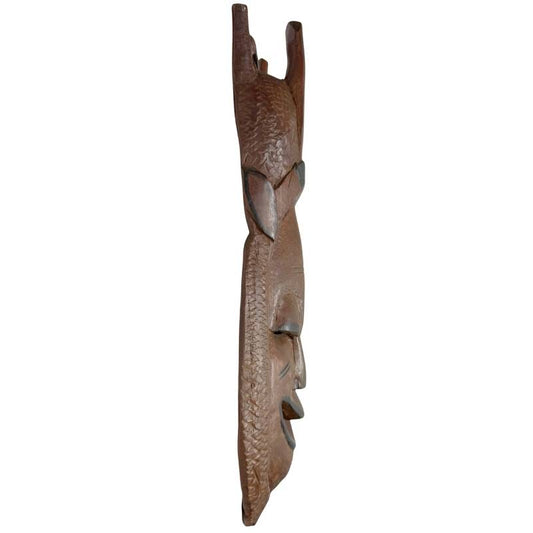 Zijaanzicht van het 2 kg zware massieve Afrikaanse hardhouten masker, uitstekend geschikt als exclusieve muurdecoratie.