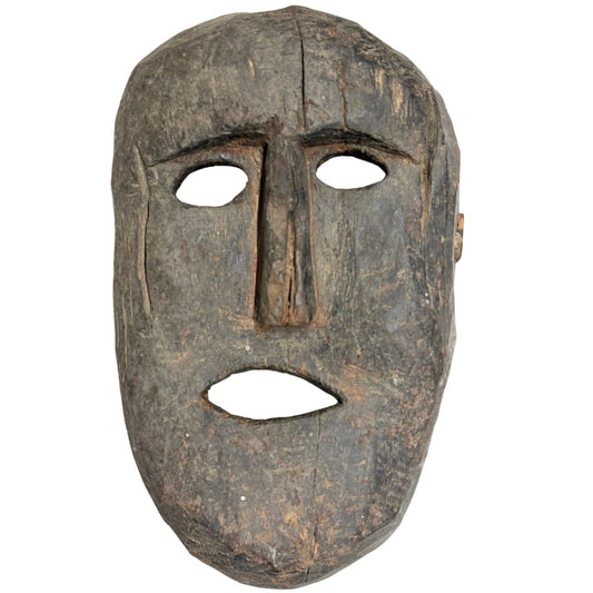 Authentiek antiek houten sjamanenmasker uit de Himalaya-regio, primitief handgesneden met diepe draagpatina