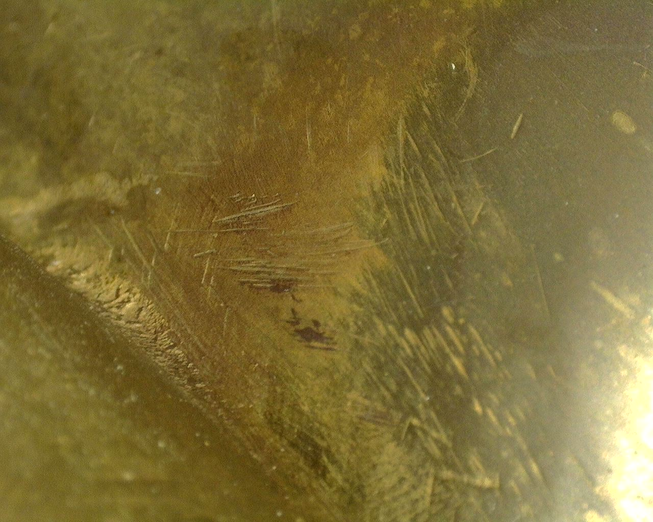 Detailansicht der Quecksilbervergoldung mit charakteristischer feuervergoldeter Textur und jahrhundertealter Patina.